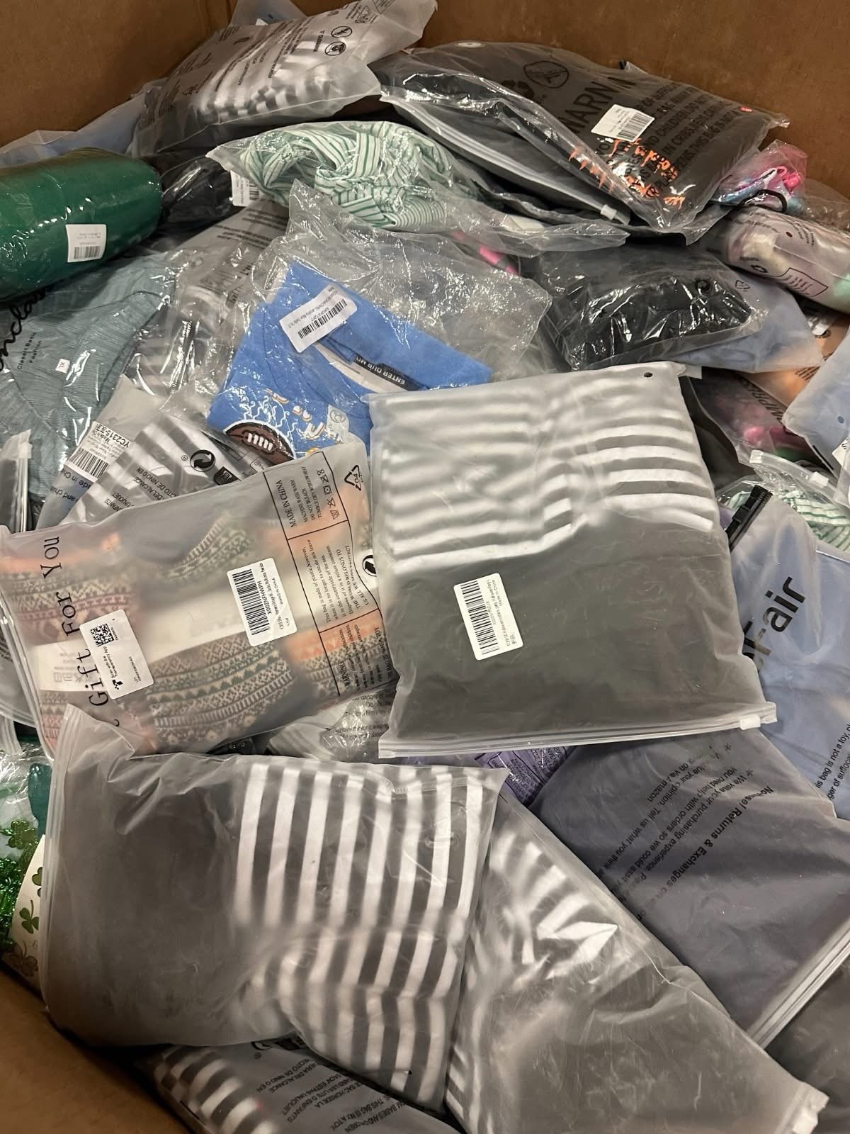 Amazon Clothing Liquidation Pallet – Poly-Bagged Mixed Apparel Load